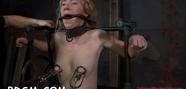  Restrained cutie is made to suffer below hard toy playing